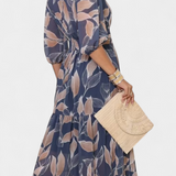 Aísha Vestido Largo Floral con Corte Fluido y Motivo de Hojas