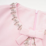 Linda Vestido Midi Acampanado con Lazo de Cristal y Detalles Elegantes