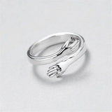 Anillo Ajustable Tipo Abrazo en Plateado