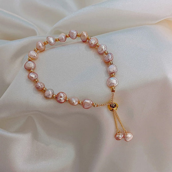 Pulsera de Perlas Rosas en Oro