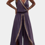 Donatila Mono Único con Detalles Dorados y Pierna Abierta