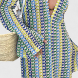 Crisanta Vestido Largo Estampado con Ondas Multicolores y Manga Larga